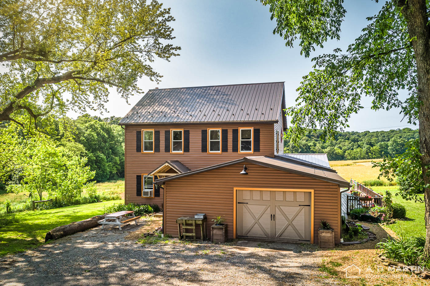 Amazing Farmhouse Remodel with a Bronze Metal Roof and ...